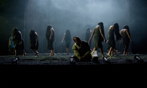 Simon Trinder (Orestes) with The Furies in The Oresteia. Photo by Graeme Cooper.